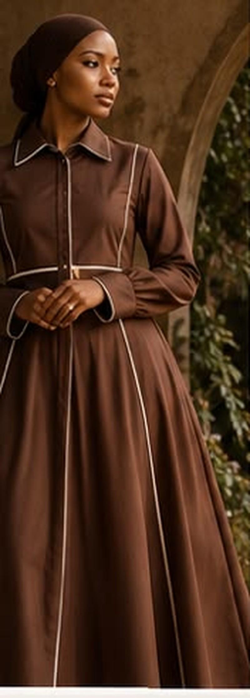 A Ngano Dzedu modest set in chocolate brown, photographed in warm natural light